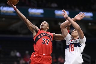 Kyshawn George (à droite) à la lutte avec Jahmi'us Ramsey. KEYSTONE/AP/Nick Wass